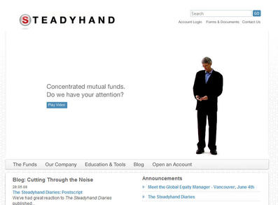 Steadyhand's CEO checks his phone while he waits for the user to interact with him, like a game character waiting for a player to start