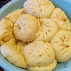 Homemade steamed baozi. Apparently, they’re still investigating how much yeast is required for the amount of flour they used. Source: Grace Lau.